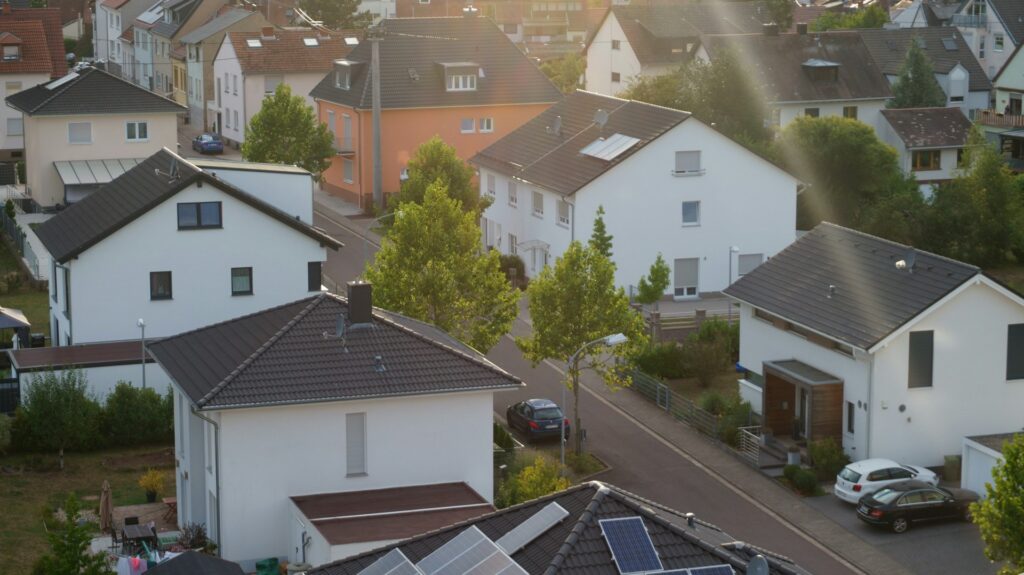 Residential neighbourhood of older detached and semi-detached houses at dusk – existing properties when buying an older house