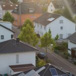 Residential neighbourhood of older detached and semi-detached houses at dusk – existing properties when buying an older house