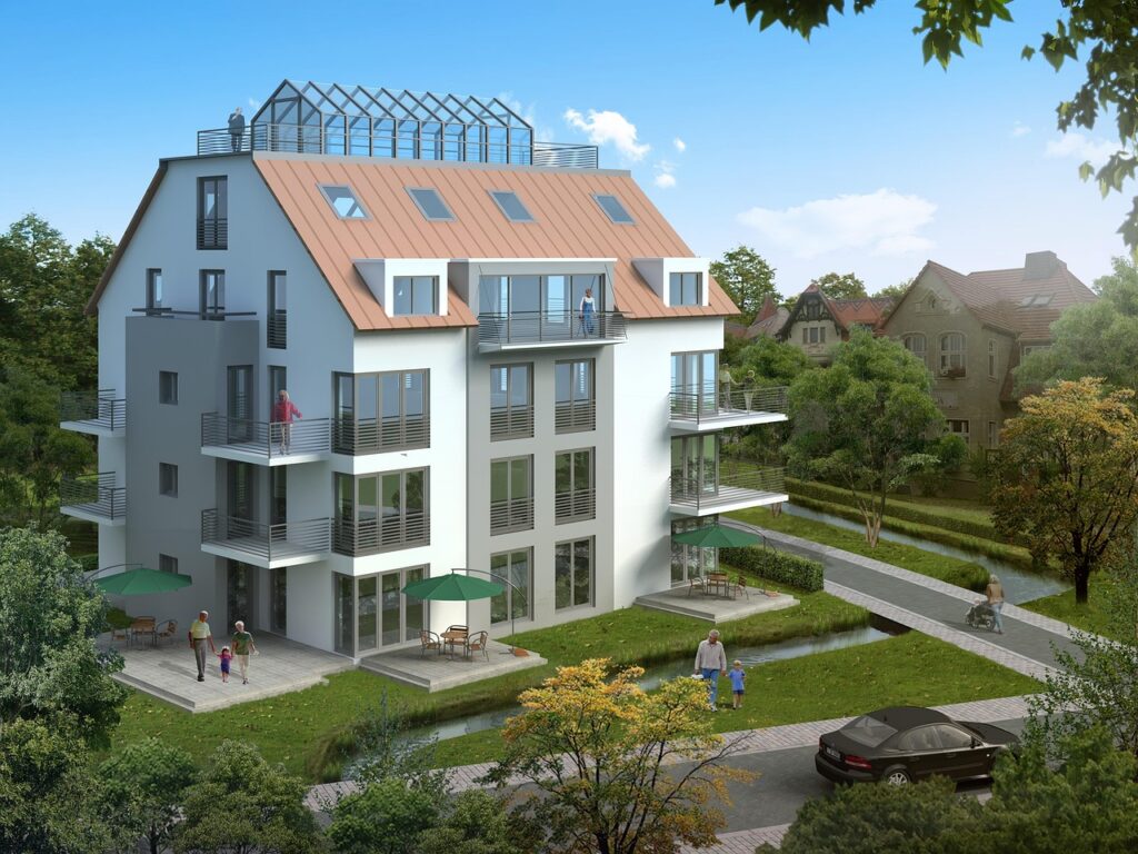 Visualisierung eines Mehrfamilienhauses mit Balkonen und Gartenanlage – typisches Bewertungsobjekt im Ertragswertverfahren
